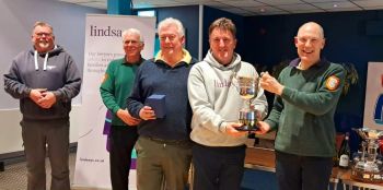 Trophy presentation to winning curlers in the closely contested Lindsays Phin League